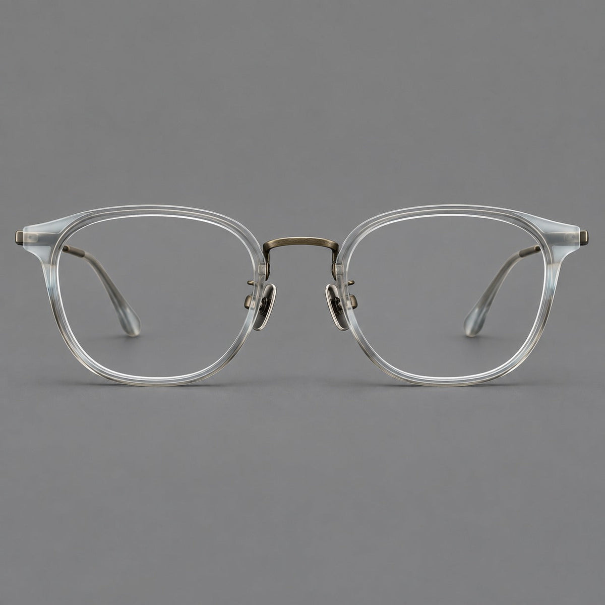 Retro soft square eyeglasses in acetate and titanium with a curved bridge and slender temples in Ice Gray Tortoiseshell / Antique Gold, front view