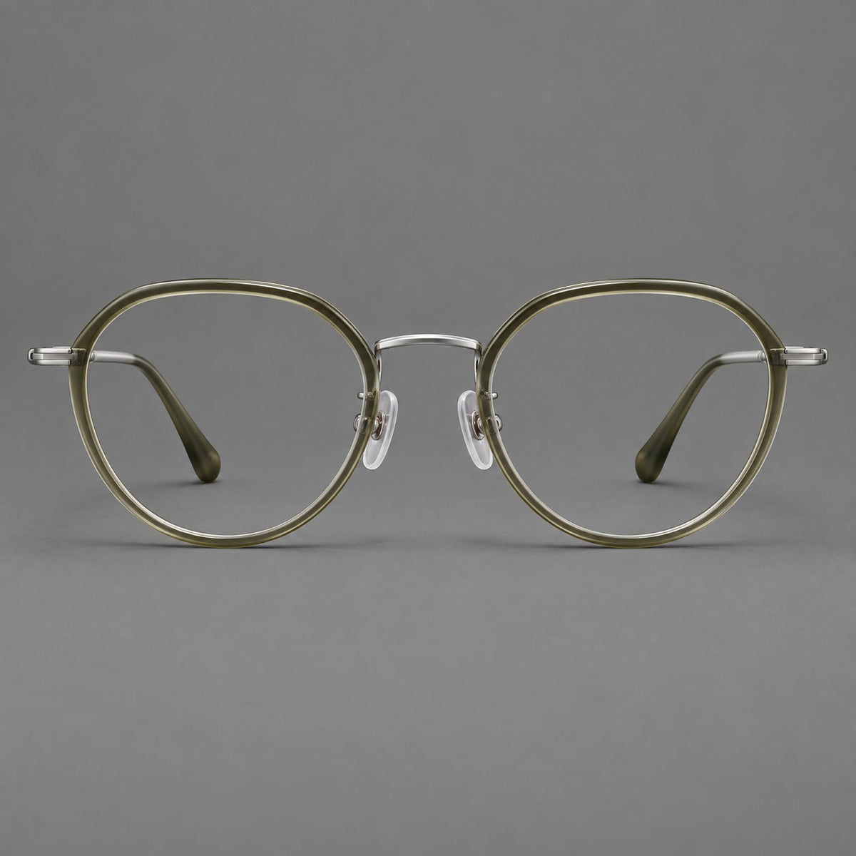 Rounded eyeglasses in acetate and titanium with gently arched brows and engraved metal temples in Gray Green / Silver, front view