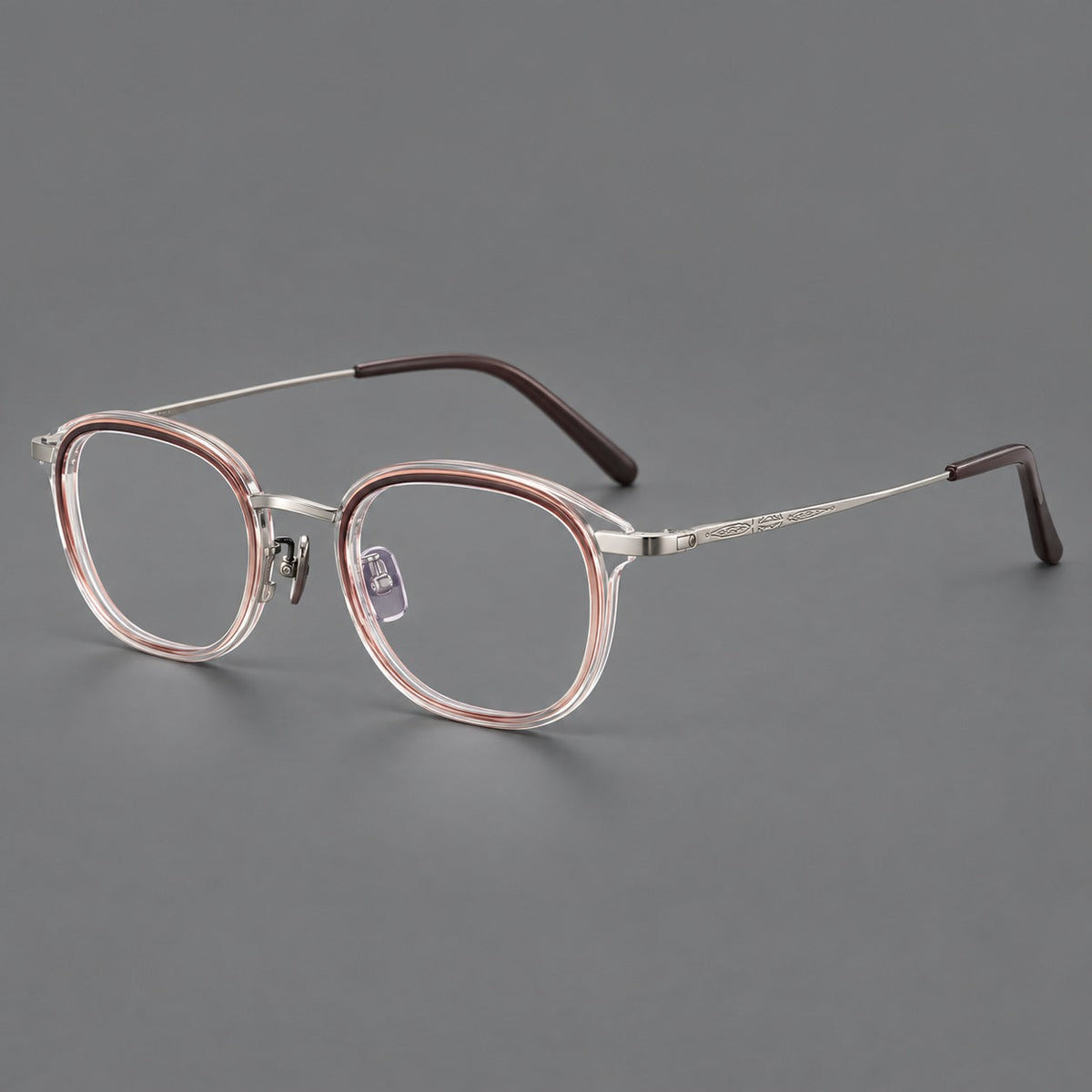 Soft square eyeglasses in acetate and titanium with rounded corners and decorative metal temples in Clear Tea Gradient / Silver, three quarter view