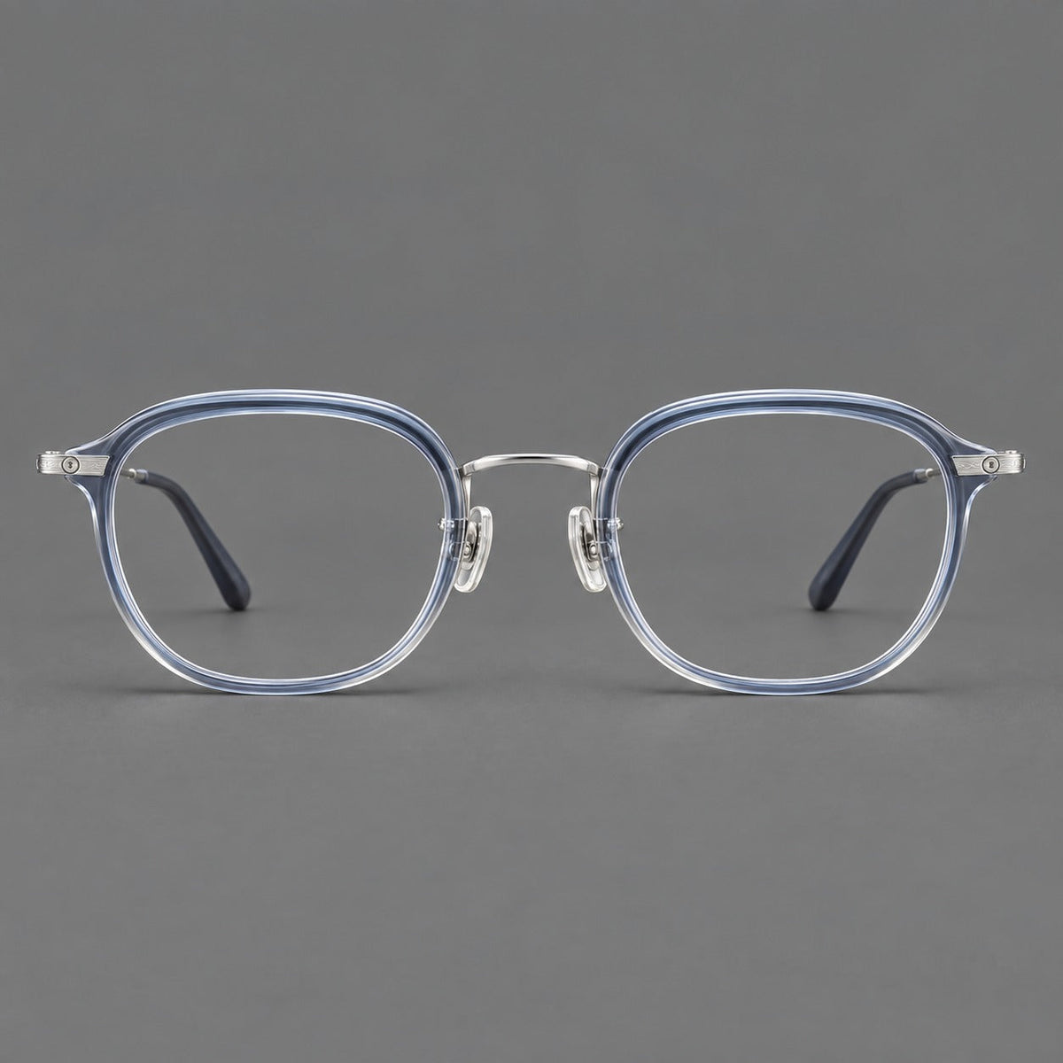 Soft square eyeglasses in acetate and titanium with rounded corners and decorative metal temples in Gray Blue Gradient / Silver, front view