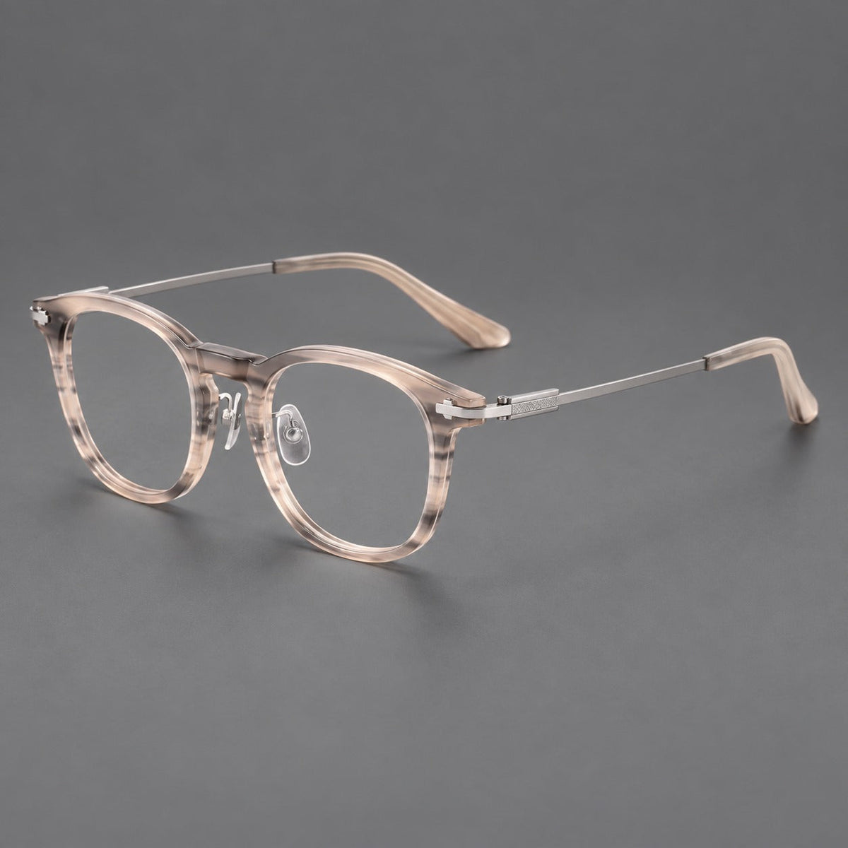 Retro acetate and titanium eyeglasses with soft square rims and sculpted metal corners in Gray Woodgrain / Silver, three quarter view