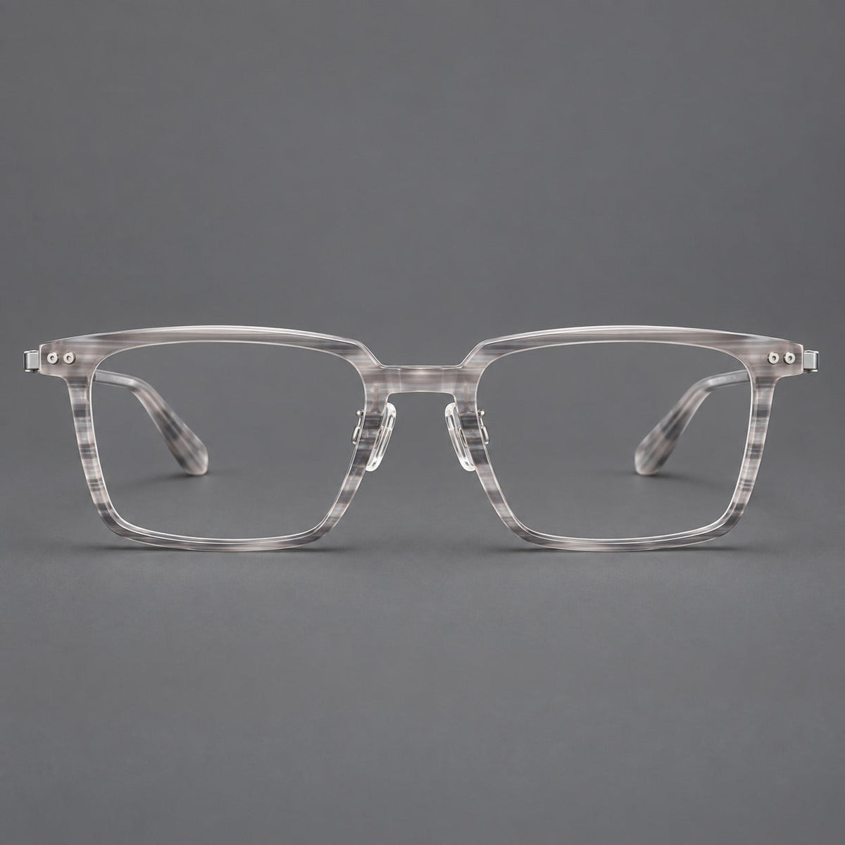 Classic acetate and titanium eyeglasses with a straight brow and rounded rectangular rims in Striped Gray / Silver, front view