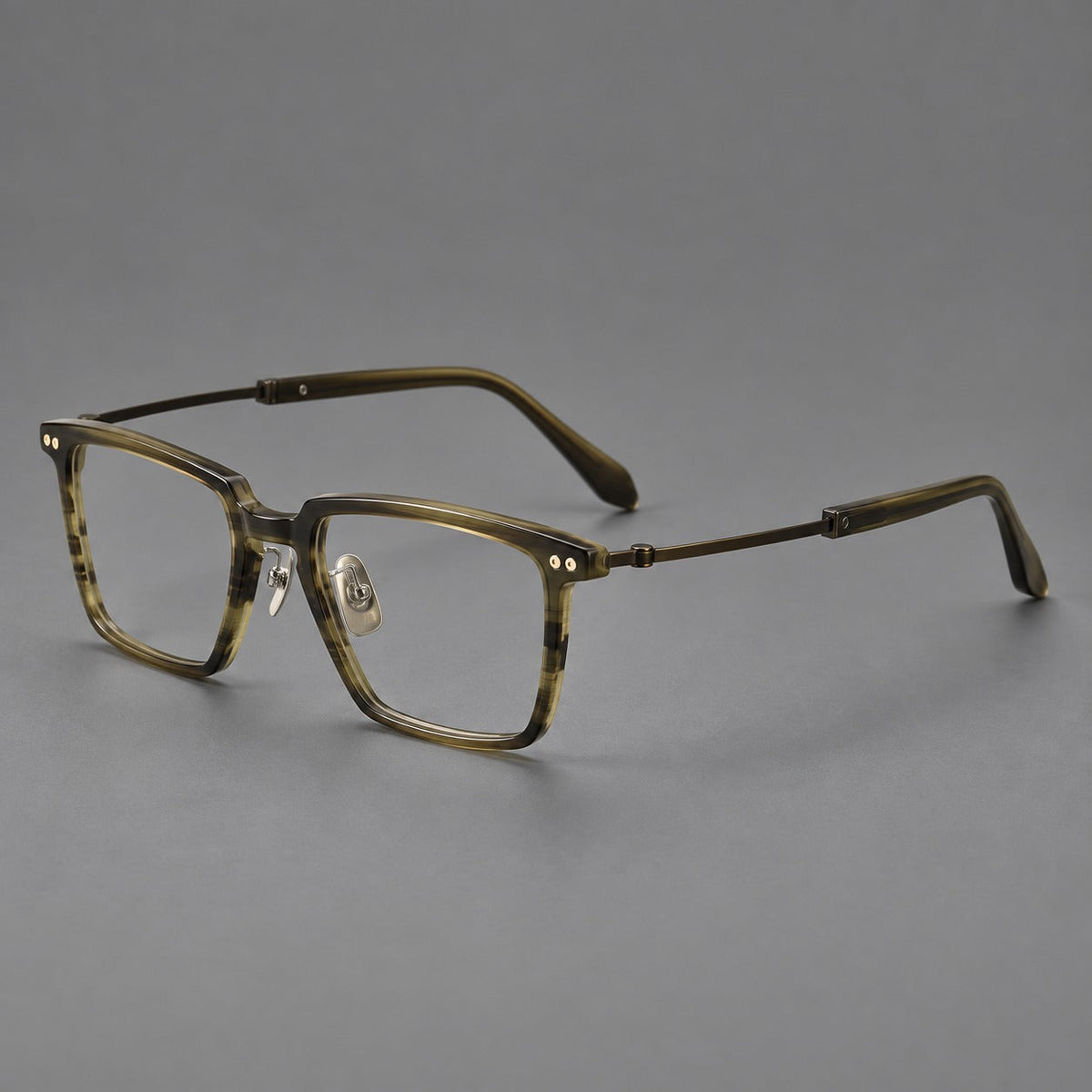 Classic acetate and titanium eyeglasses with a straight brow and rounded rectangular rims in Striped Olive Green / Bronze, three quarter view