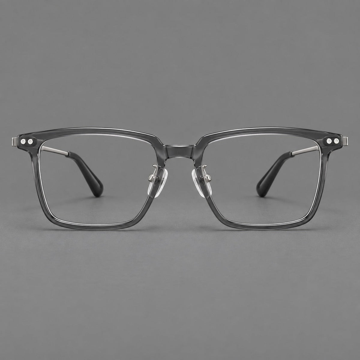 Classic acetate and titanium eyeglasses with a straight brow and rounded rectangular rims in Clear Gray / Silver, front view