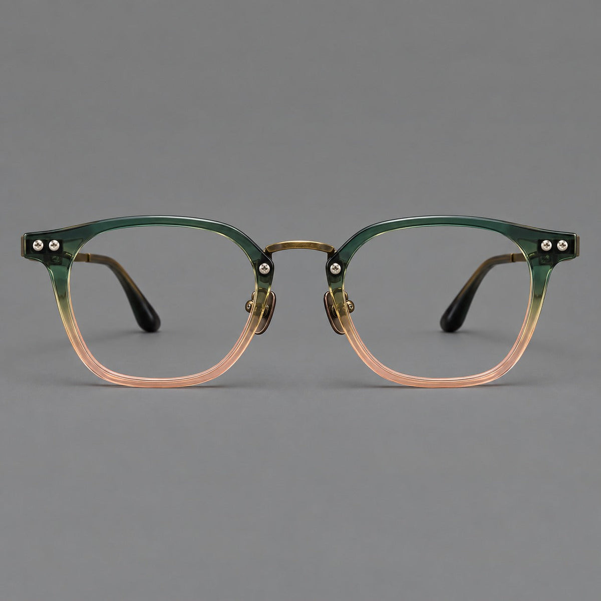 Retro acetate and titanium eyeglasses with softly rounded rims and a metal bridge in Green Pink Gradient / Antique Bronze, front view