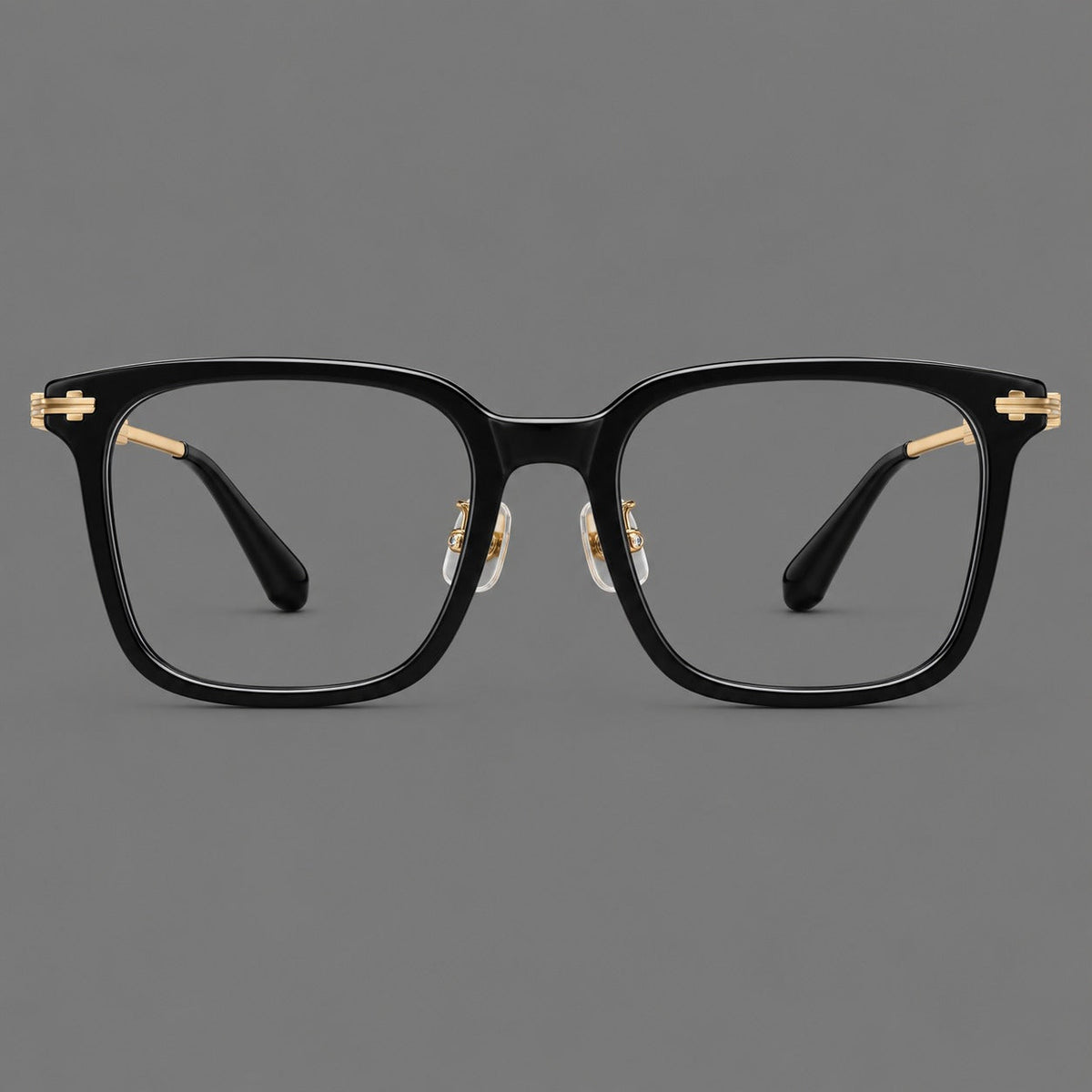Classic acetate and titanium eyeglasses with broad square rims and textured metal temples in Black / Gold, front view