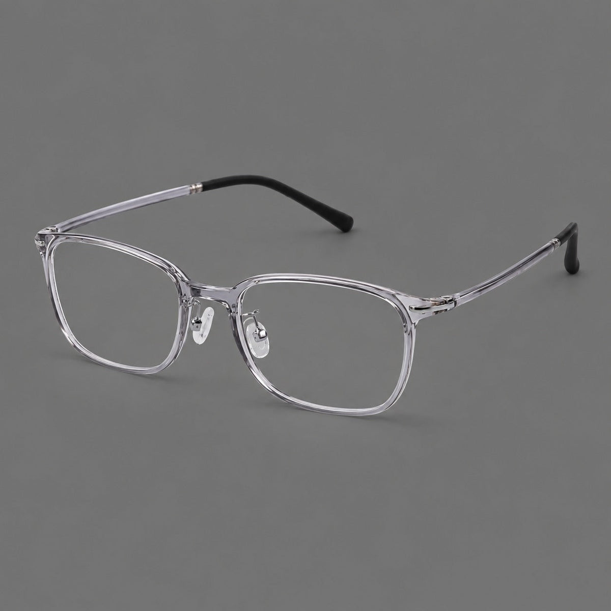 Classic square plastic eyeglasses with broad lenses and softly rounded edges in Clear Gray, three quarter view