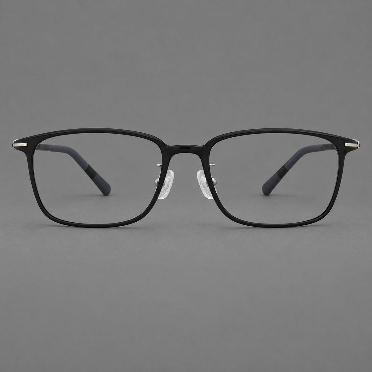 Low profile rectangular plastic eyeglasses with a straight browline and slim temples in Matte Black, front view