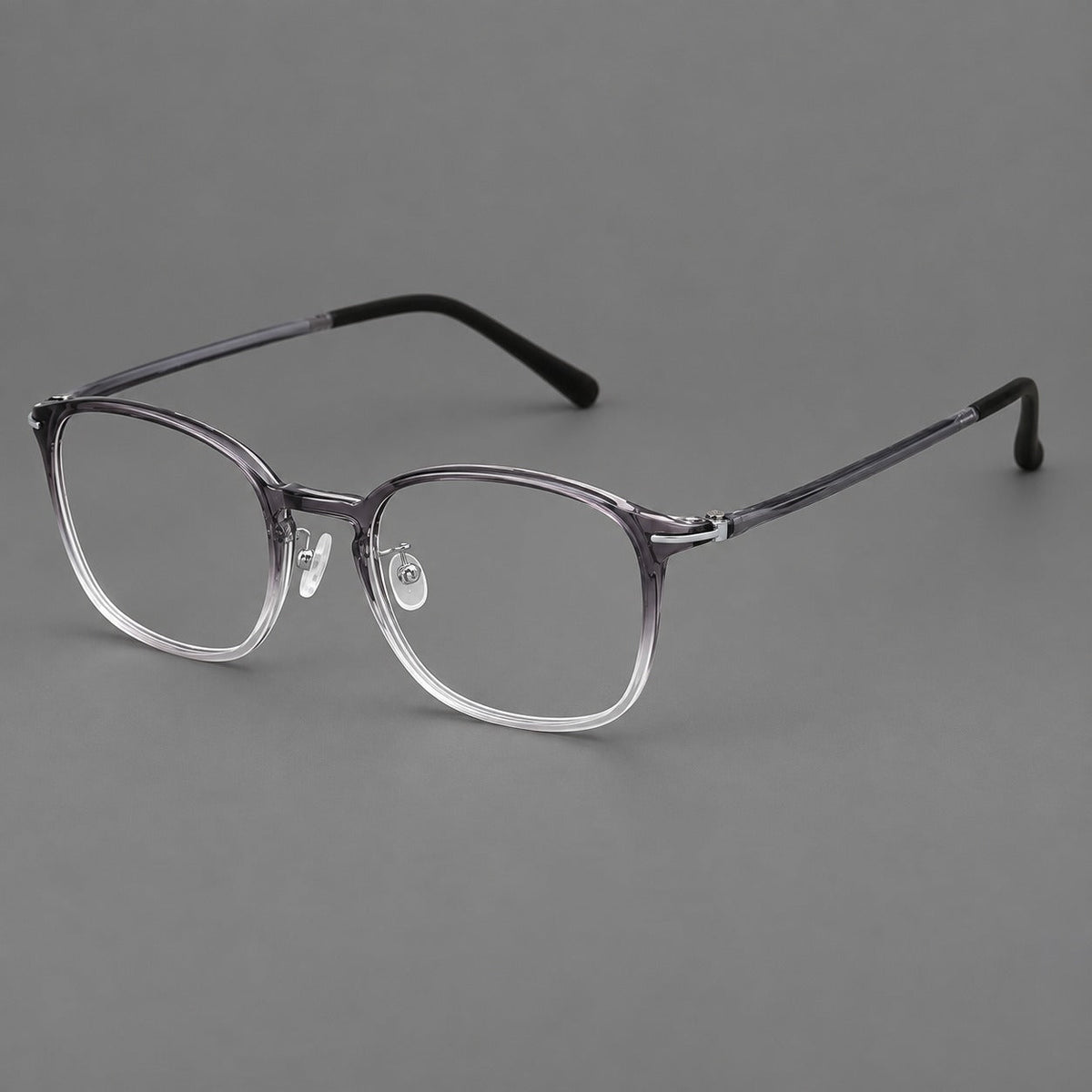 Vintage soft square plastic eyeglasses with deep lenses and a gently arched bridge in Ink Gray Gradient, three quarter view