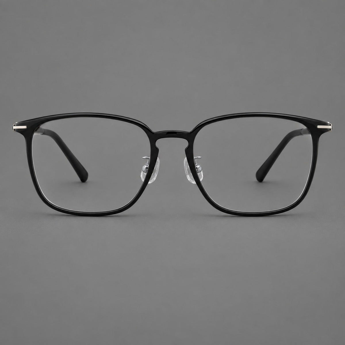 Bold square plastic eyeglasses with a defined browline and an open bridge in Glossy Black, front view