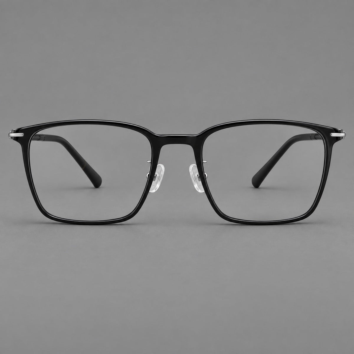 Modern square plastic eyeglasses with a smooth browline and slim metal corner details in Glossy Black, front view