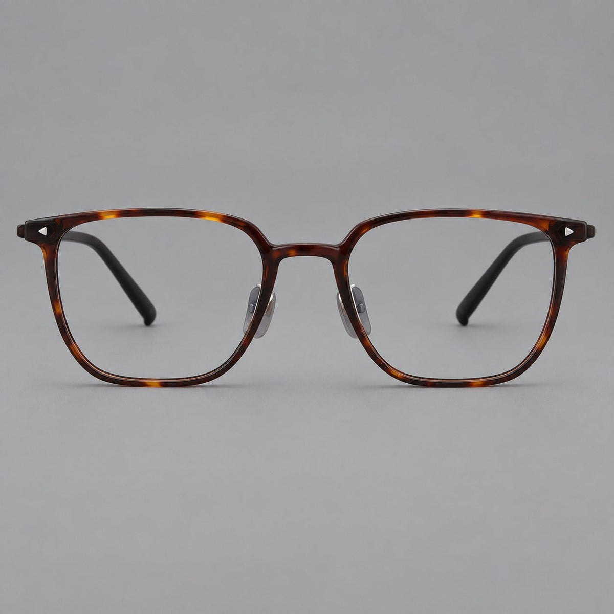Refined rectangular plastic eyeglasses with raised outer corners and clear nose pads in Tortoiseshell, front view