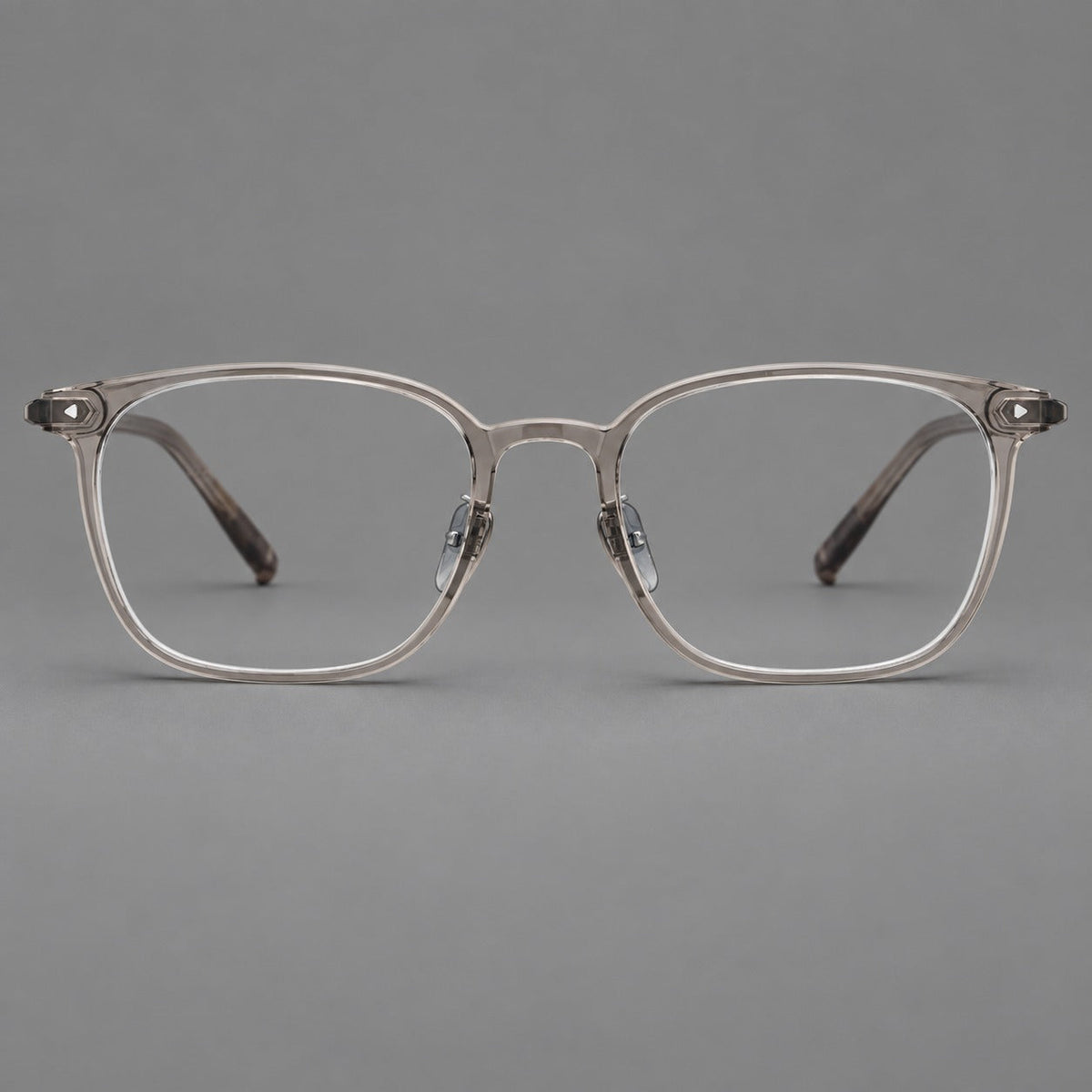 Classic soft square plastic eyeglasses with a gently curved browline and corner studs in Gray Brown, front view