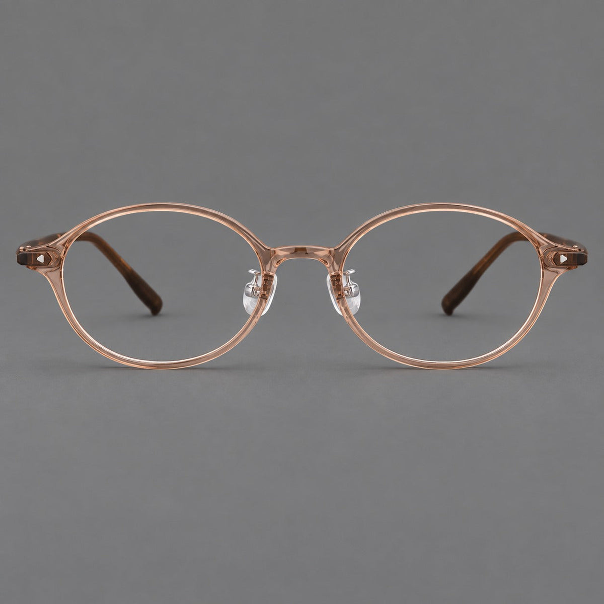 Retro round plastic eyeglasses with softly lifted corners and a sculpted bridge in Tea, front view
