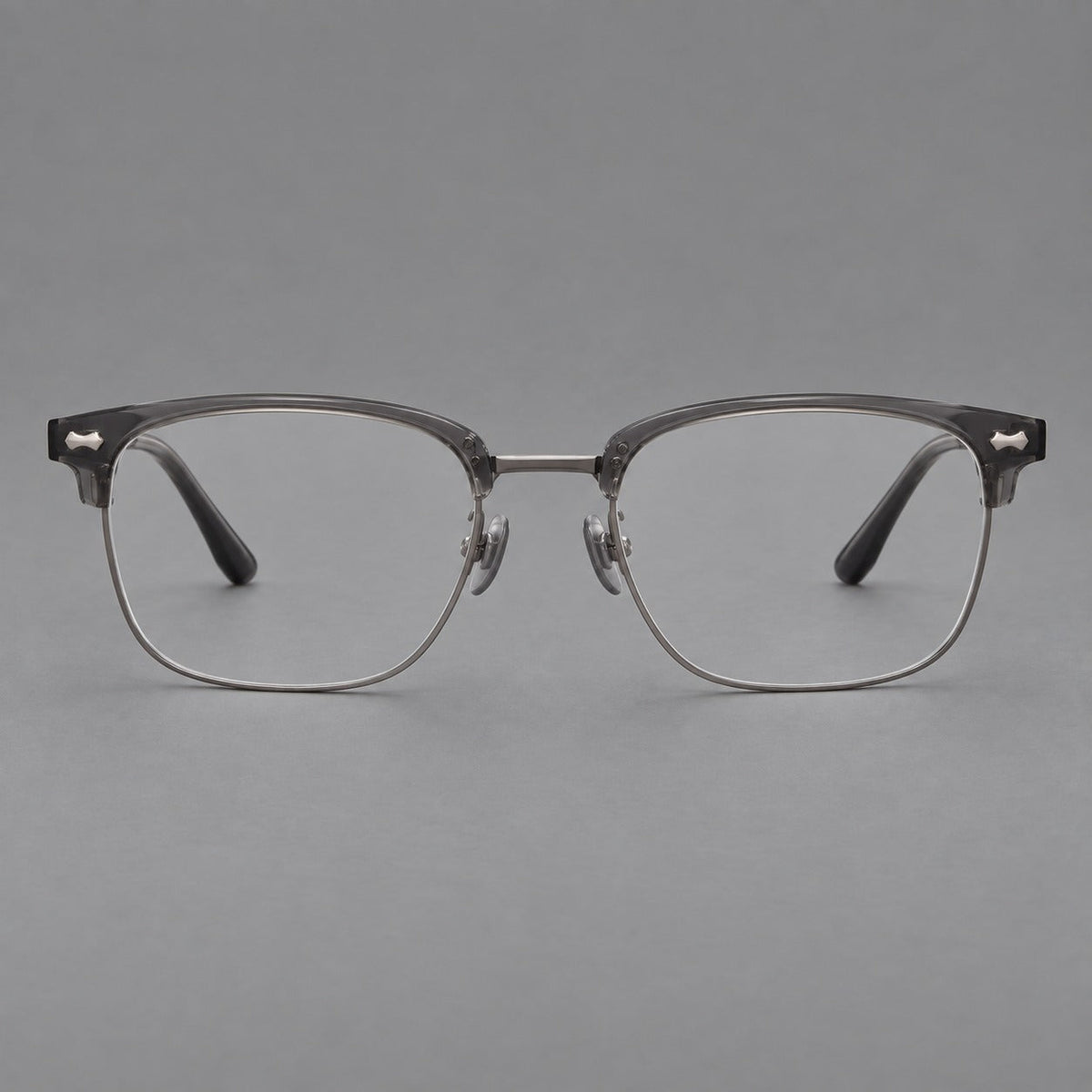 Classic browline titanium glasses with fine lower rims and subtle corner accents in Gunmetal, front view