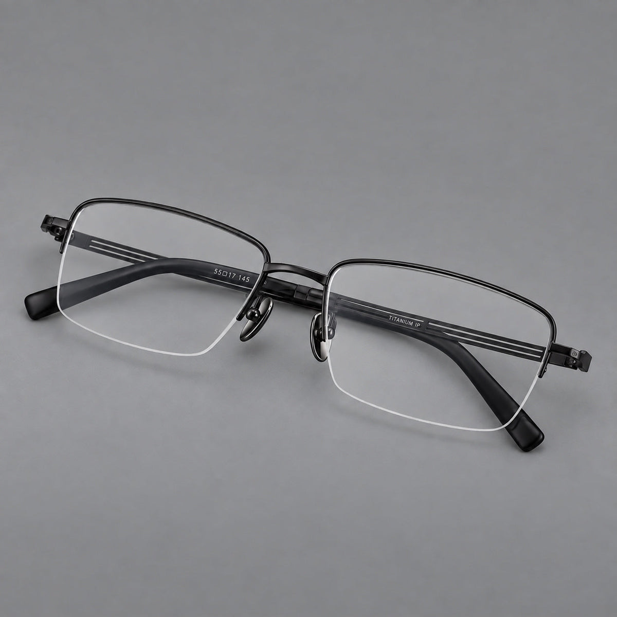 Classic half frame titanium glasses with rectangular lenses and lined temples in Black, three quarter view