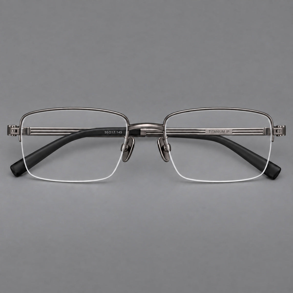 Classic half frame titanium glasses with rectangular lenses and lined temples in Gunmetal, front view