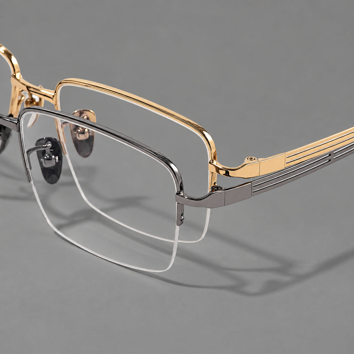 Classic half frame titanium glasses with rectangular lenses and lined temples, frame details