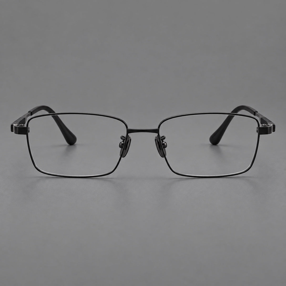 Slim rectangular titanium glasses with broad temples and contrasting dark inserts in Black, front view