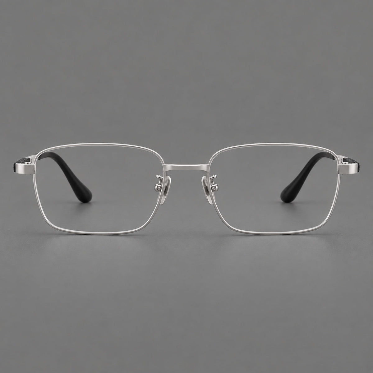 Slim rectangular titanium glasses with broad temples and contrasting dark inserts in Silver, front view