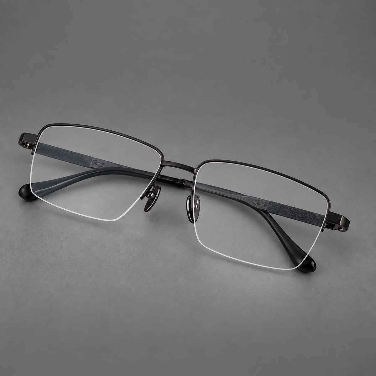 Wide half frame titanium glasses with rectangular lenses and textured temples in Black, three quarter view