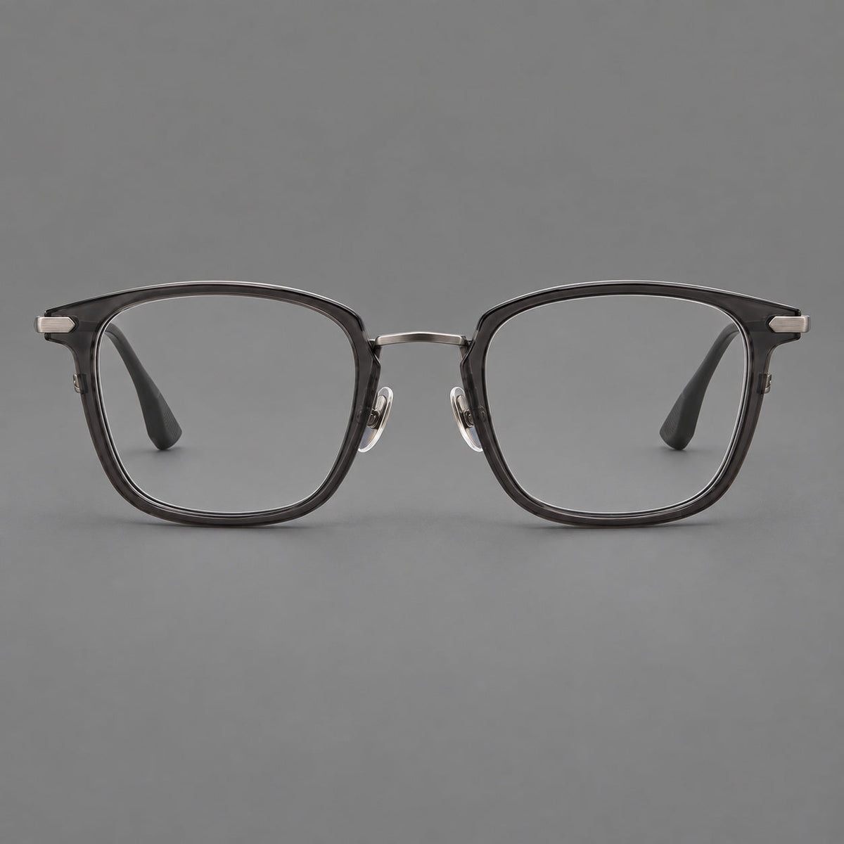 Bold square titanium glasses with a separate bridge and long metal corner accents in Gunmetal, front view