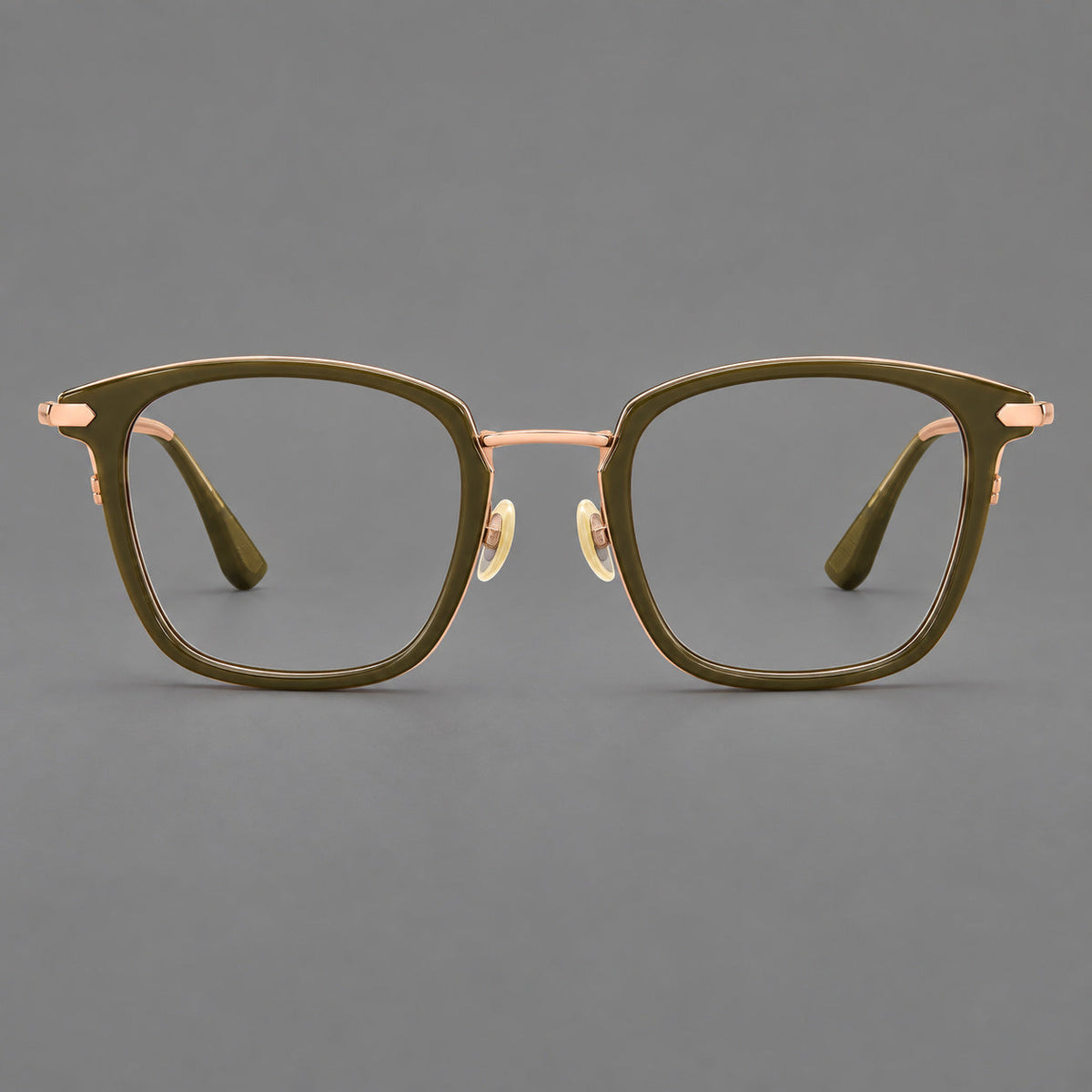 Bold square titanium glasses with a separate bridge and long metal corner accents in Olive Green and Rose Gold, front view