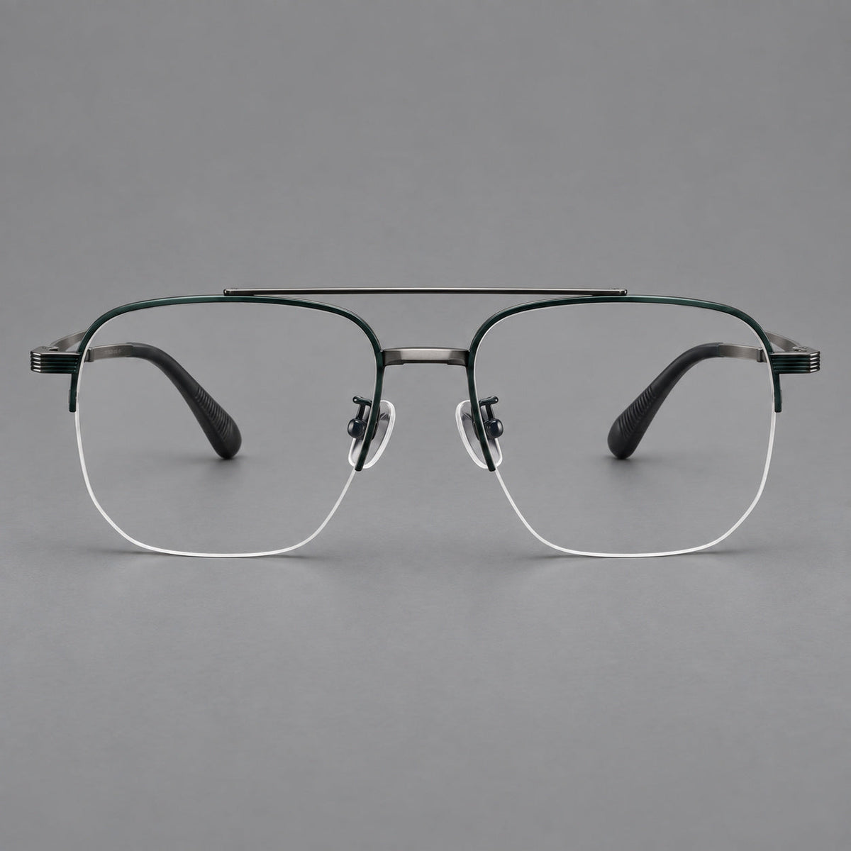 Angular aviator titanium glasses with a double bridge and an open lower rim in Dark Green and Gunmetal, front view