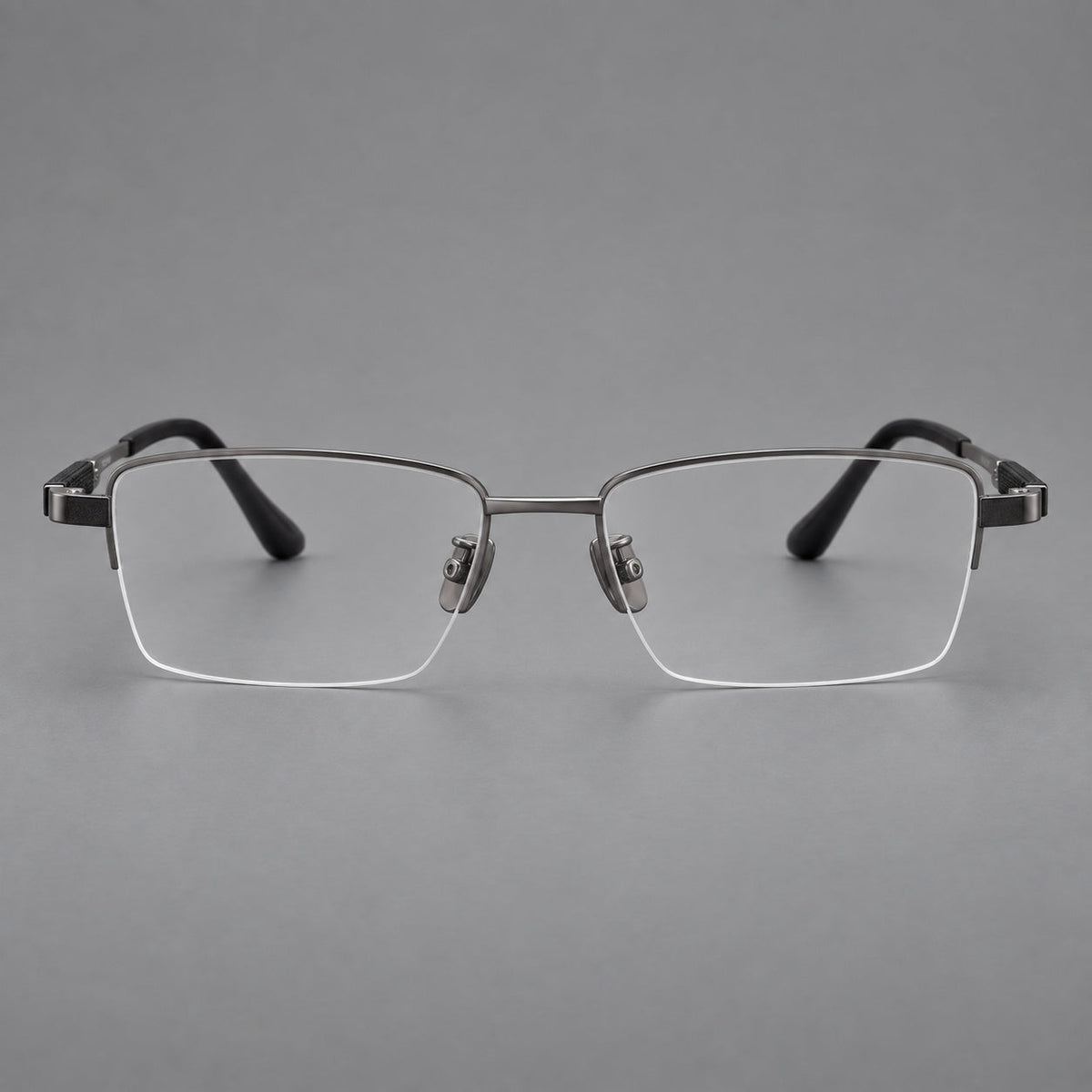 Modern half frame titanium glasses with a narrow bridge and dark temple sections in Gray, front view