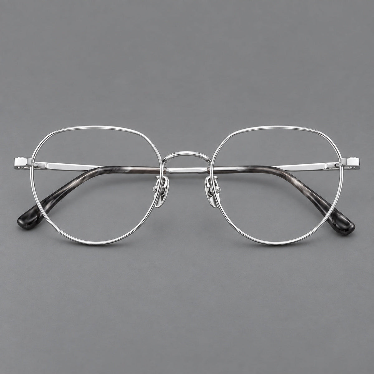 Classic panto titanium glasses with a curved bridge and slim straight temples in Silver, front view