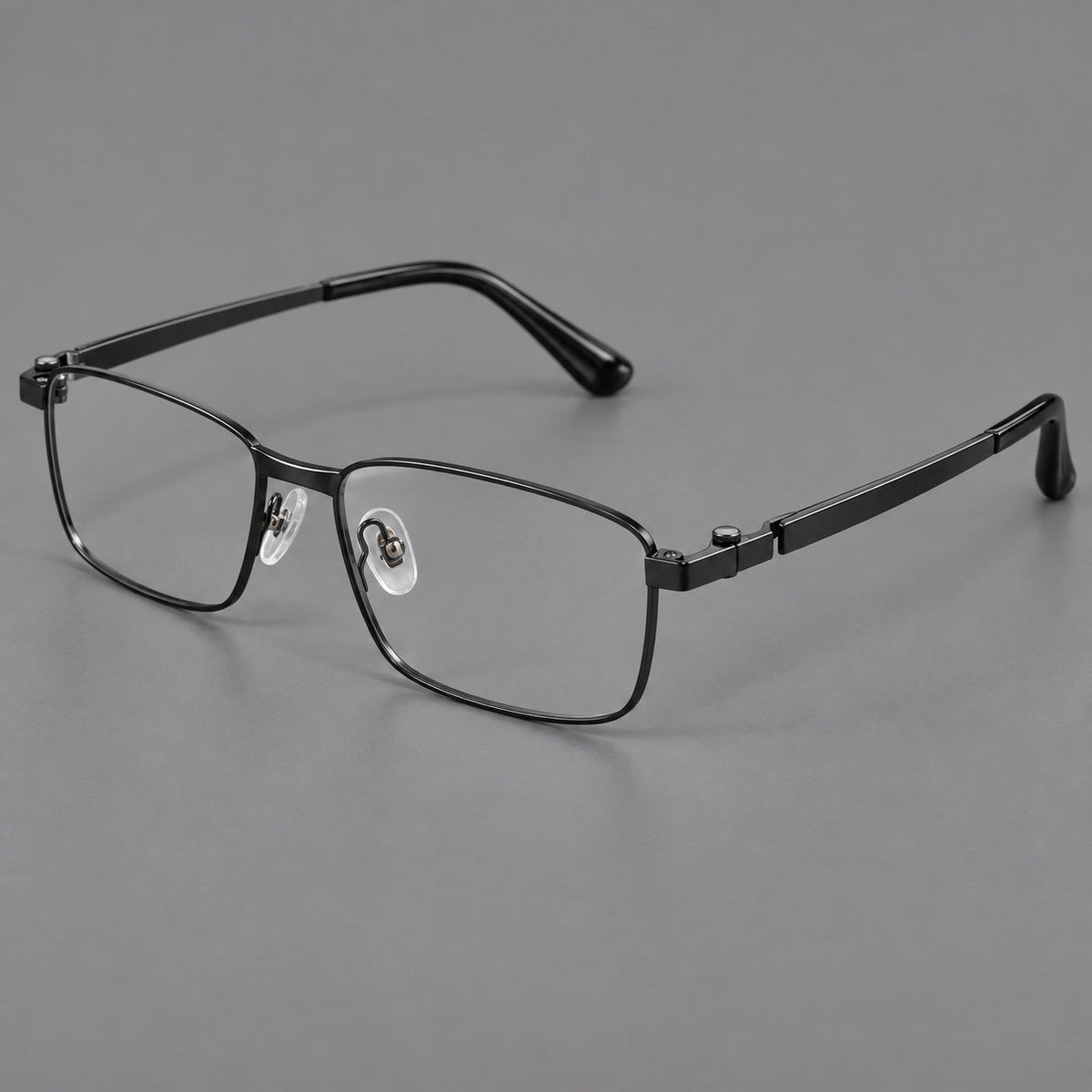 Wide rectangular titanium glasses with a broad bridge and rounded hinge caps in Black, three quarter view