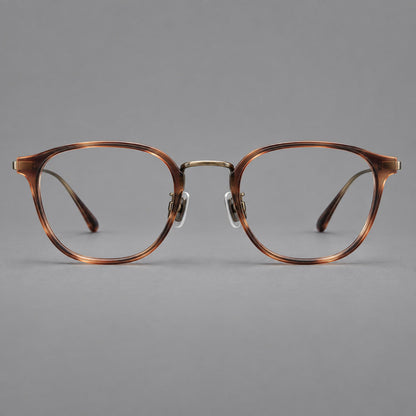 Retro soft square eyeglasses in acetate and titanium with a curved bridge and slender temples in Amber Tortoiseshell / Antique Gold, front view side view