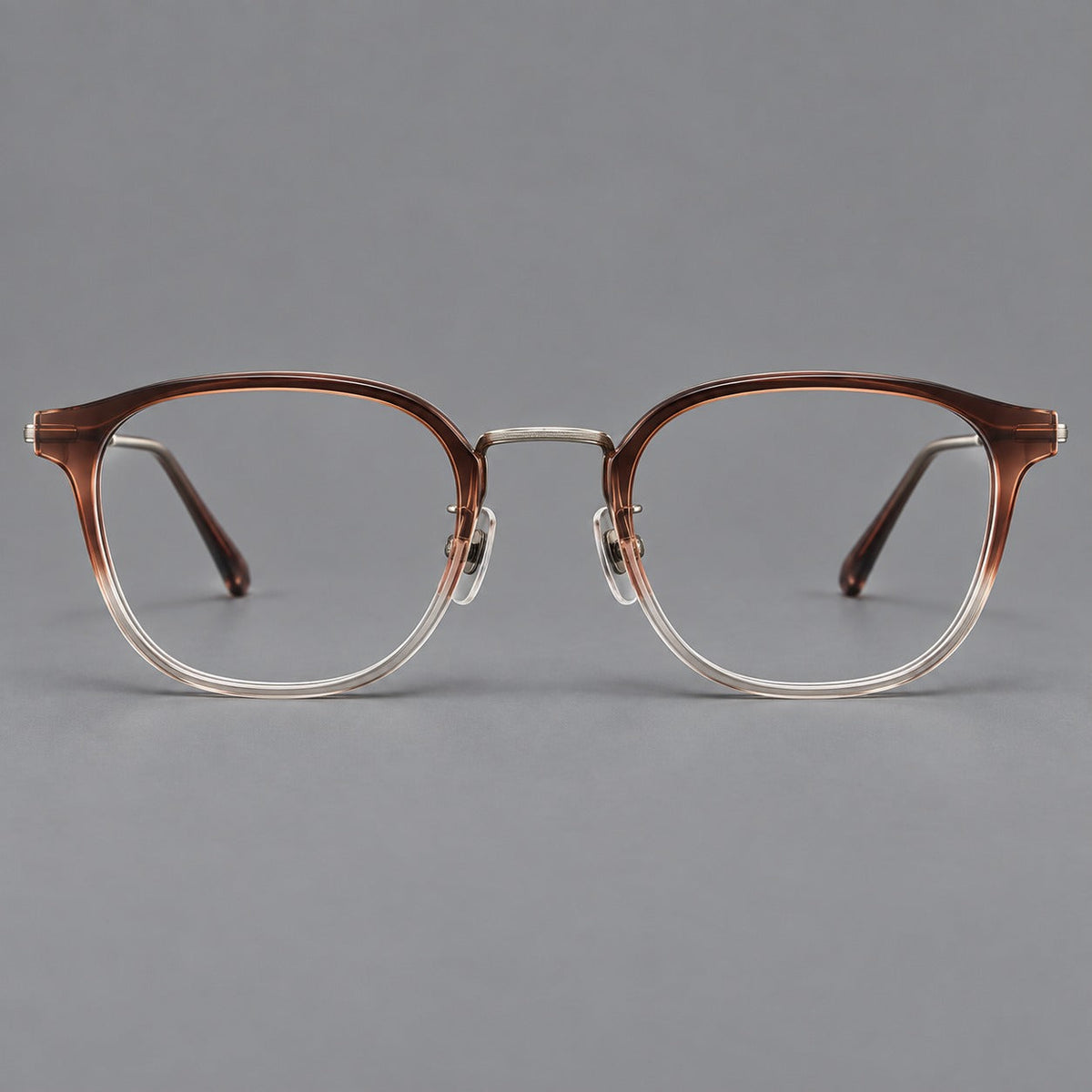 Retro soft square eyeglasses in acetate and titanium with a curved bridge and slender temples in Brown Gradient / Light Gunmetal, front view