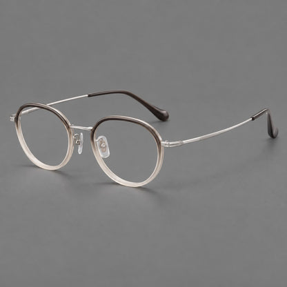 Rounded eyeglasses in acetate and titanium with gently arched brows and engraved metal temples in Mist Gray Gradient / Silver, three quarter view front view