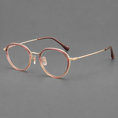 Rounded eyeglasses in acetate and titanium with gently arched brows and engraved metal temples in Pink Tea Gradient / Rose Gold, three quarter view lens detail