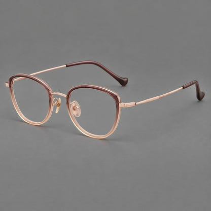 Upswept eyeglasses in acetate and titanium with softly rounded rims and tapered metal temples in Pink Tea Gradient / Rose Gold, three quarter view front view