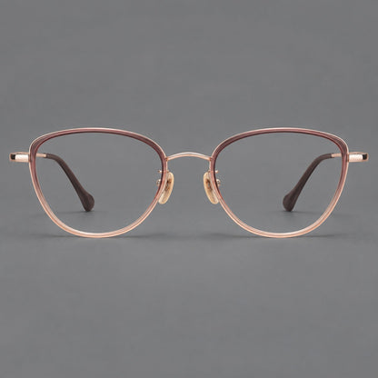Upswept eyeglasses in acetate and titanium with softly rounded rims and tapered metal temples in Pink Tea Gradient / Rose Gold, front view frame detail