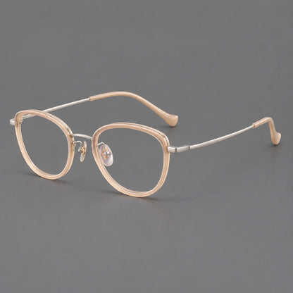 Upswept eyeglasses in acetate and titanium with softly rounded rims and tapered metal temples in Nude Pink / Silver, three quarter view additional product view