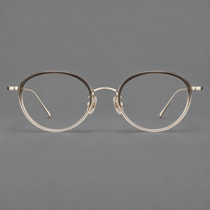 Round eyeglasses in acetate and titanium with a slim curved bridge and fine metal temples in Gray Tea Gradient / Gold, front view temple detail