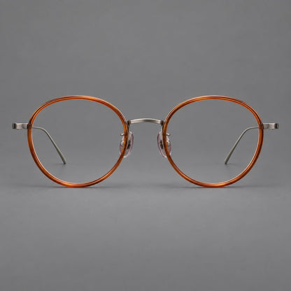 Classic round eyeglasses in acetate and titanium with slim rims and textured metal temples in Tea Brown / Gunmetal, front view side view