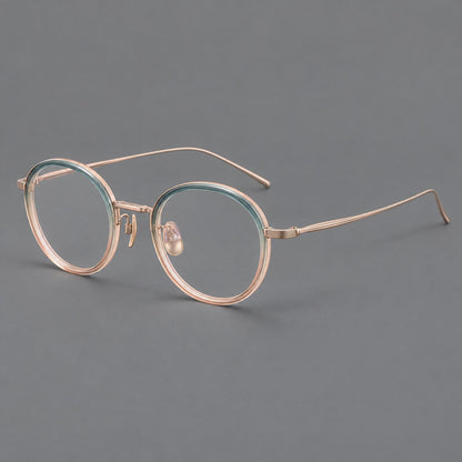 Classic round eyeglasses in acetate and titanium with slim rims and textured metal temples in Blue Tea Gradient / Rose Gold, three quarter view front view