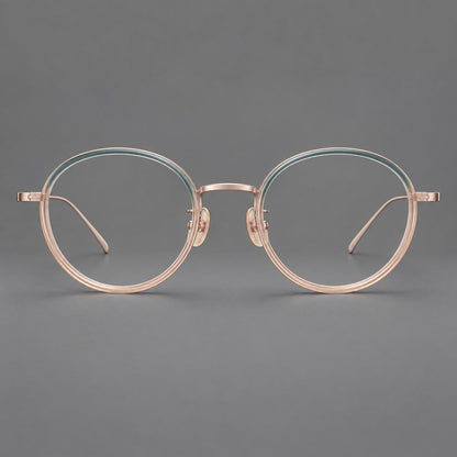Classic round eyeglasses in acetate and titanium with slim rims and textured metal temples in Blue Tea Gradient / Rose Gold, front view frame detail