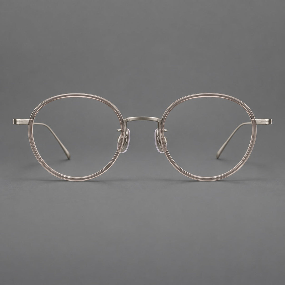 Classic round eyeglasses in acetate and titanium with slim rims and textured metal temples in Gray Pink Gradient / Gunmetal, front view