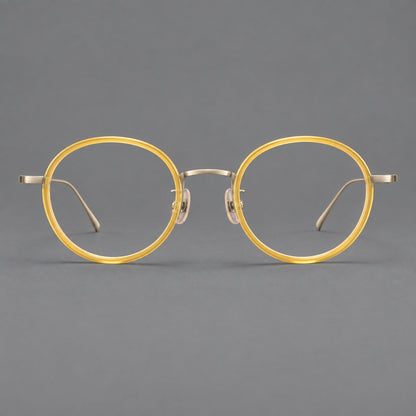 Classic round eyeglasses in acetate and titanium with slim rims and textured metal temples in Lemon Yellow / Gold, front view additional product view