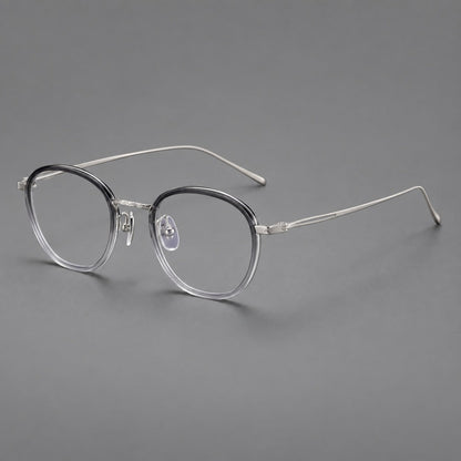 Vintage round eyeglasses in acetate and titanium with an engraved bridge and slender temples in Gray Gradient / Silver, three quarter view front view