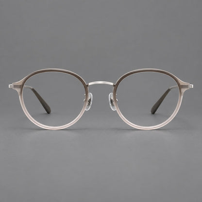 Softly rounded eyeglasses in acetate and titanium with a curved bridge and engraved temples in Tea Pink Gradient / Silver, front view temple detail