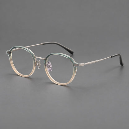 Softly rounded eyeglasses in acetate and titanium with a curved bridge and engraved temples in Green Tea Gradient / Silver, three quarter view additional product view