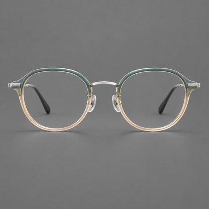 Softly rounded eyeglasses in acetate and titanium with a curved bridge and engraved temples in Green Tea Gradient / Silver, front view additional product view