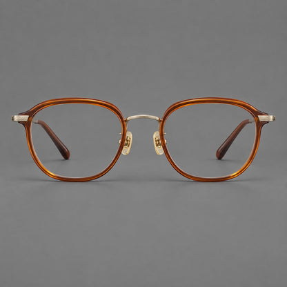 Soft square eyeglasses in acetate and titanium with rounded corners and decorative metal temples in Brown Tortoiseshell / Antique Gold, front view frame detail