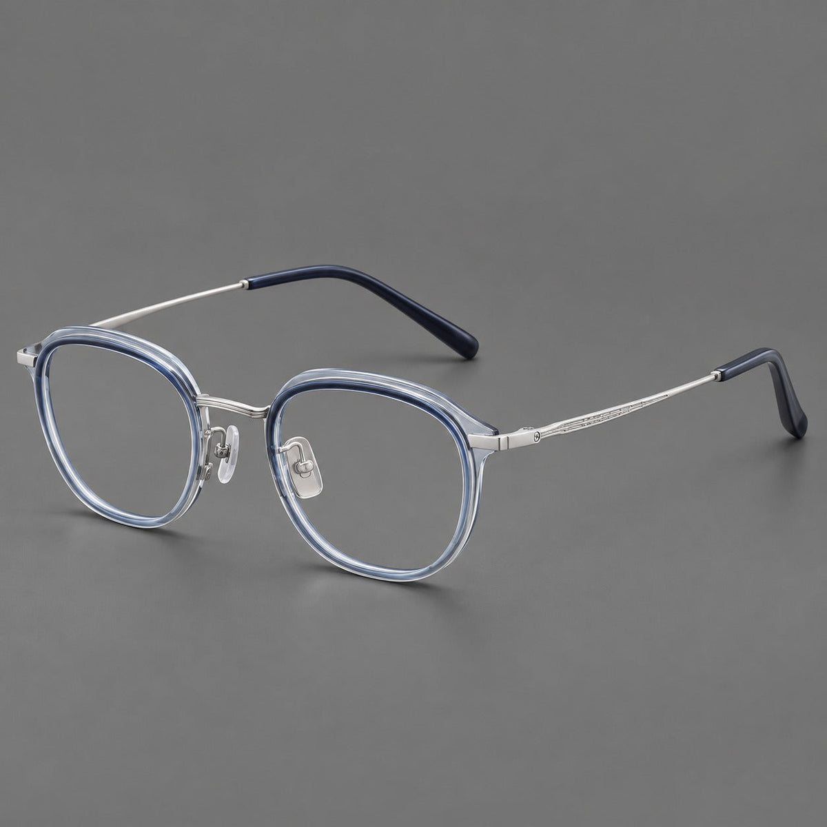 Soft square eyeglasses in acetate and titanium with rounded corners and decorative metal temples in Gray Blue Gradient / Silver, three quarter view